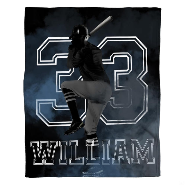 Baseball player silhouette sports theme bedding set displayed on sports theme bed frame in sports bedroom.