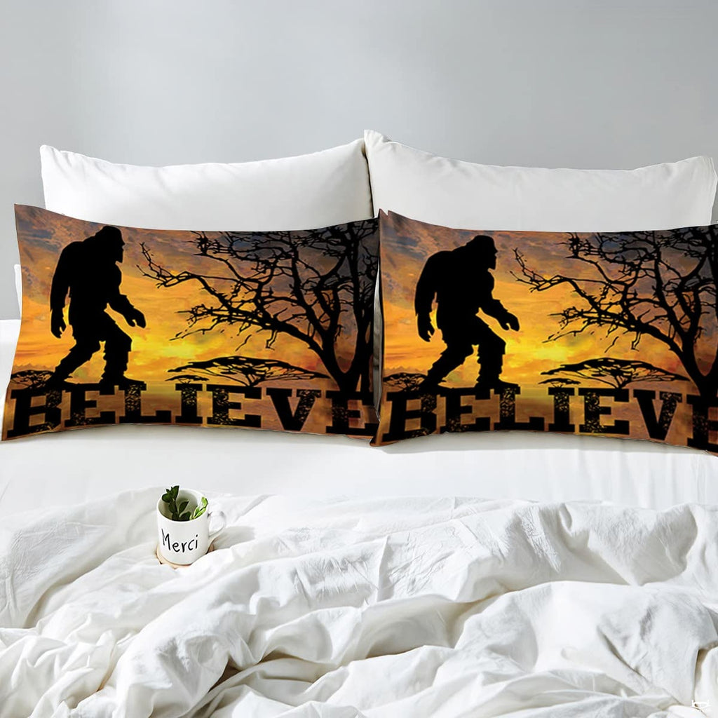 Overhead view of Bigfoot sunset wilderness bedding spread across a contemporary bedroom bed