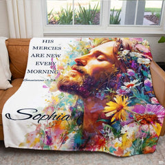 Jesus Christ blanket draped across a living room chair in a sunlit interior.