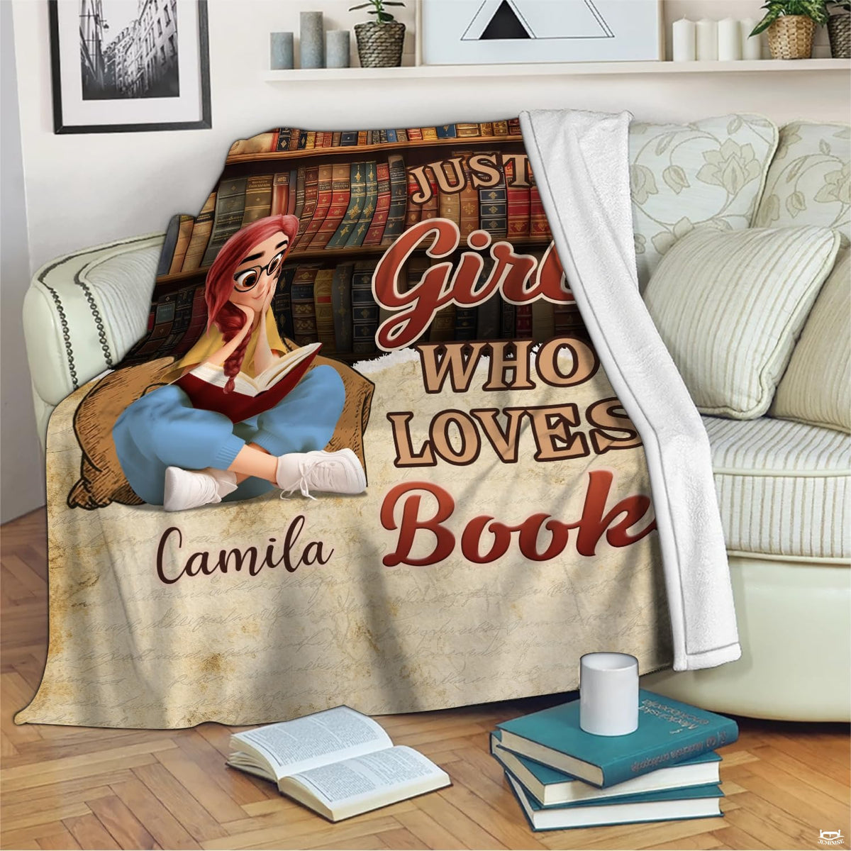 Neatly folded presentation of custom reader girl throw blanket highlighting vibrant literary graphics.
