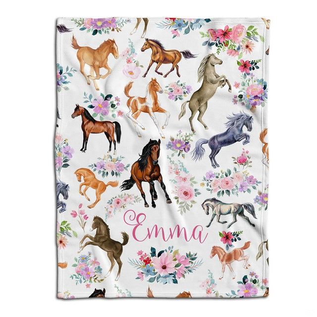 Watercolor prancing horses floral pattern blanket laid flat against white background