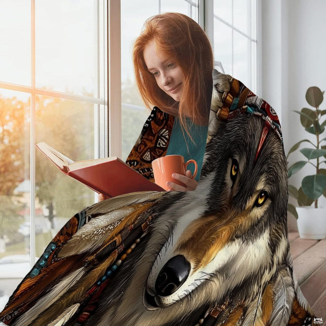 Living room sofa display showing the tribal wolf feather headdress throw blanket draped over furniture.