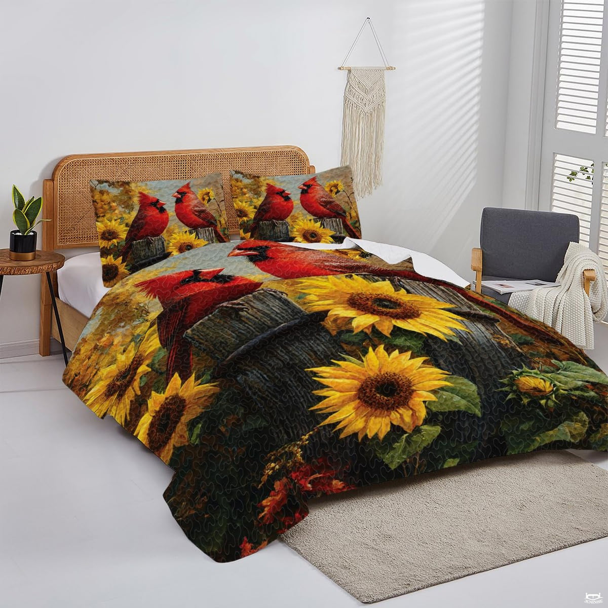 Overhead display highlighting vivid crimson songbirds surrounded by amber leaves and botanical prints.