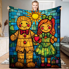 Stained glass gingerbread couple throw blanket featuring gingerbread boy and girl with red heart under sun