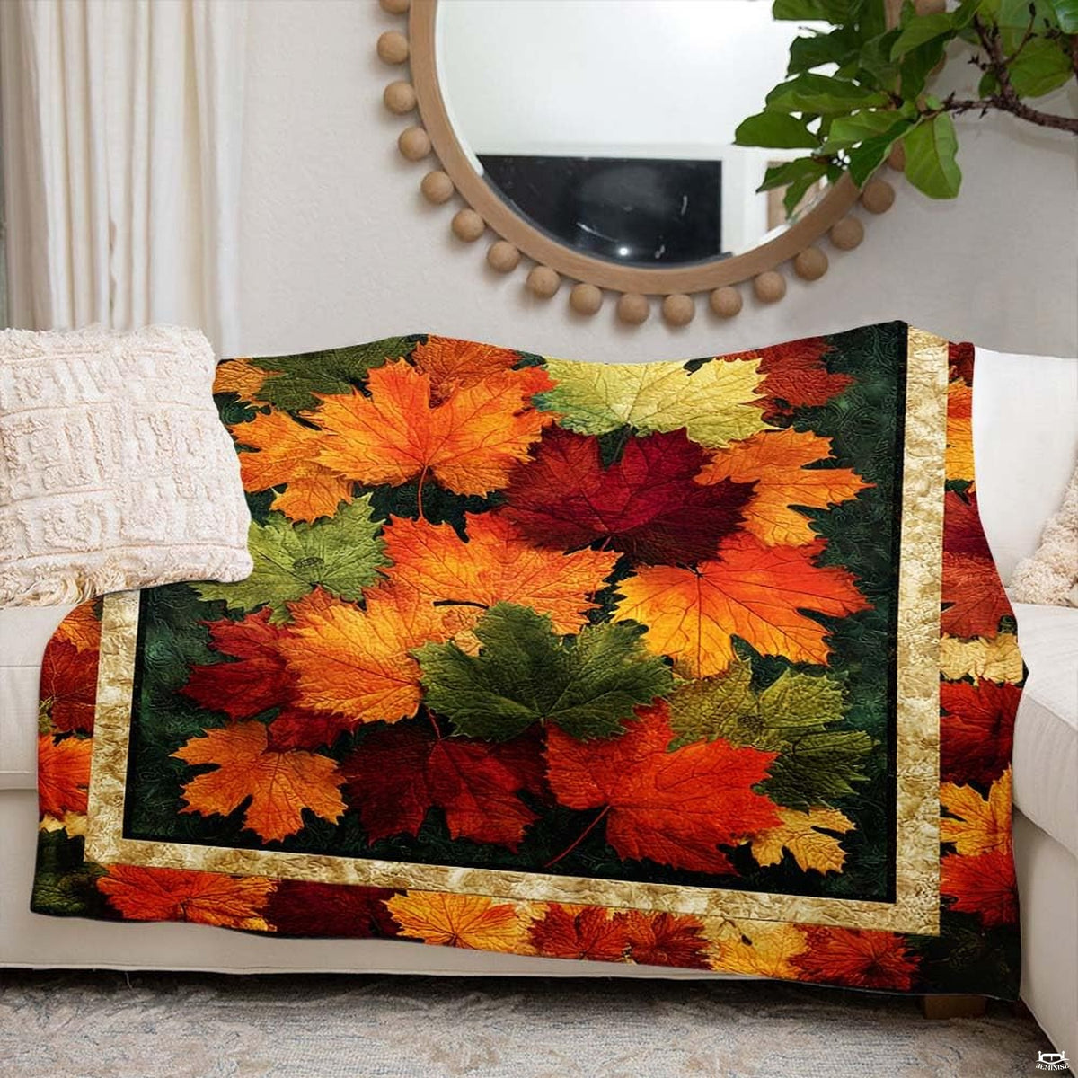 Folded rustic fall leaves throw blanket resting on wooden chair