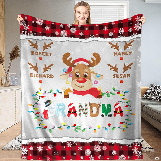 Christmas reindeer buffalo plaid throw blanket displaying cartoon reindeer and holiday bulb string garland