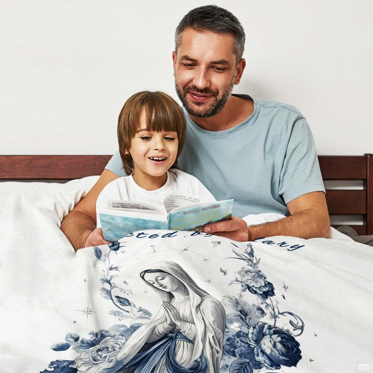 Bed presentation highlighting the peaceful blue rose Blessed Mother devotional blanket.