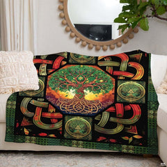 Artistic Celtic medallions and botanical vine borders on black bedding display.