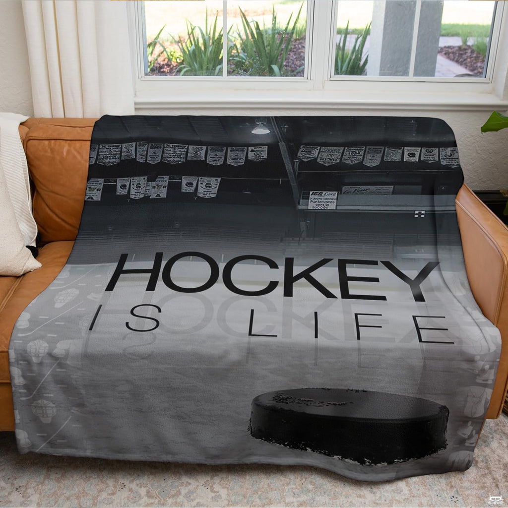 Ice hockey arena sports blanket styled across contemporary bed