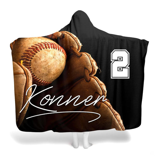Baseball glove blanket featuring a realistic baseball resting in a fielding mitt on black.