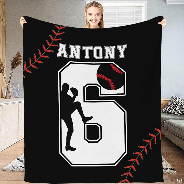 Graphic baseball theme bedding showing pitcher in motion badge with red curved seam corners.