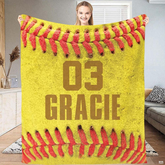 Close up macro view of macro softball throw blanket highlighting fabric texture and vibrant yellow dye tones