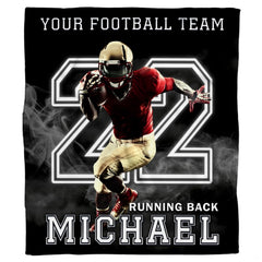 Close view of sprinting athlete in gold helmet and glowing numerals on blanket
