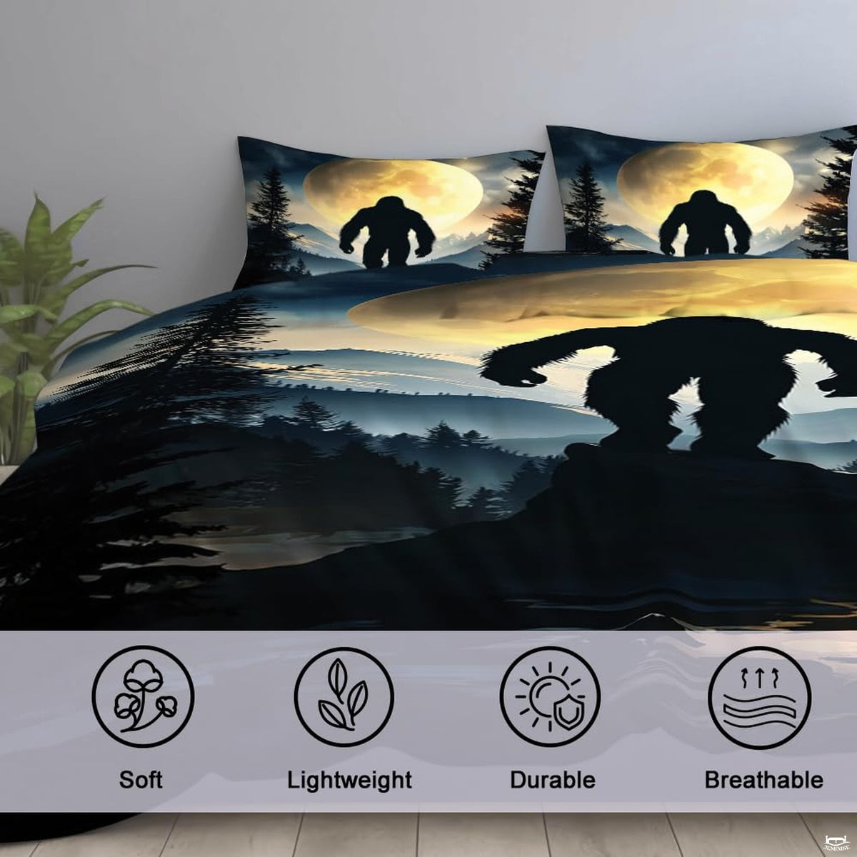High-angle view of bigfoot graphic bedding showing rich midnight obsidian, gold, and slate tones across bed.
