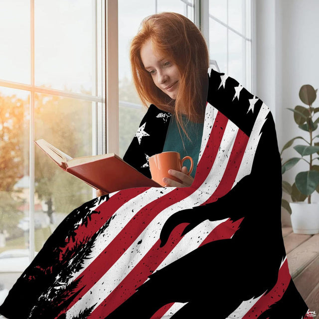 Close view of sasquatch silhouette and distressed patriotic flag on blanket