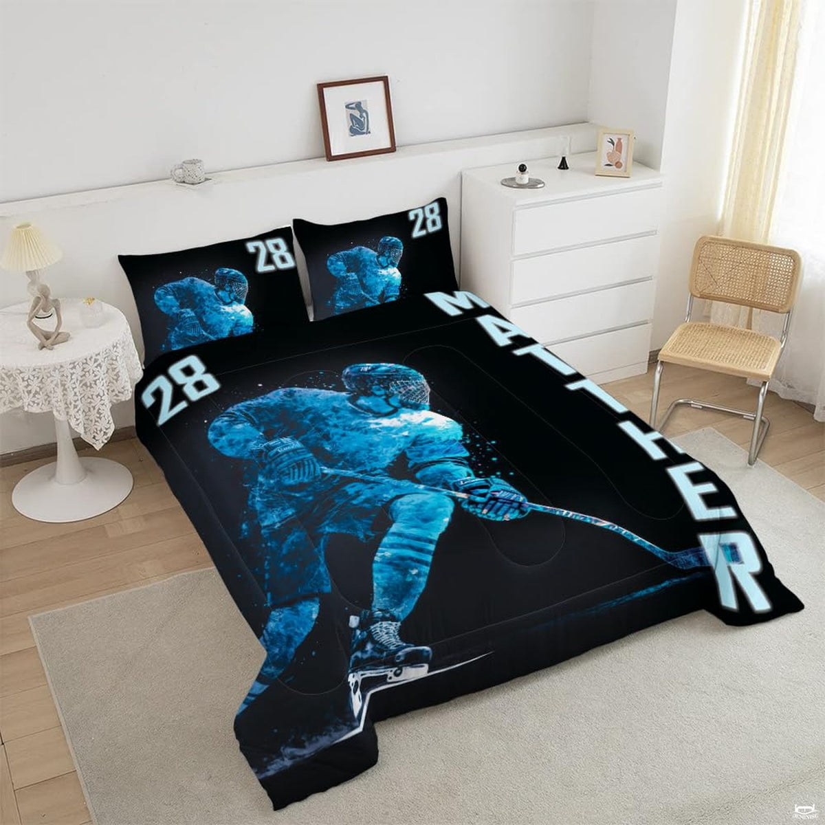 Close-up perspective of hockey bedding highlighting goalie silhouette, ice spray effects, and equipment graphics