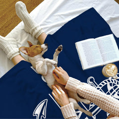 Anchor and bed rope set design featured in an elegant coastal bedroom setting.