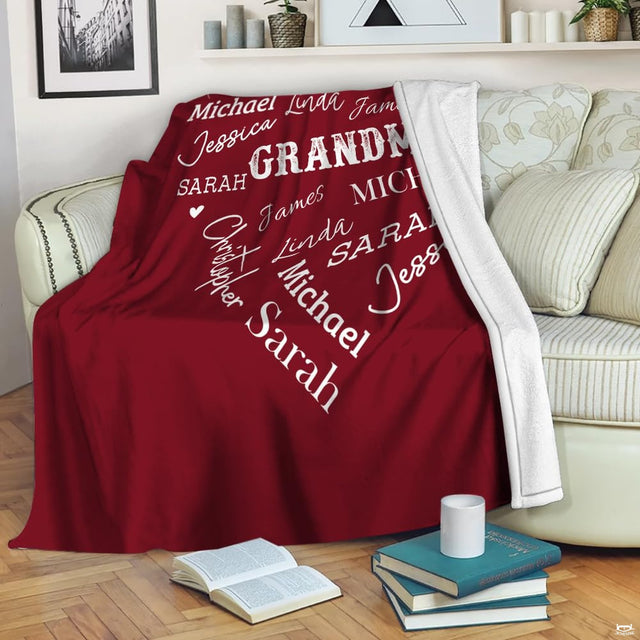 Deep burgundy bedding print with graceful white typography and heart illustrations in a bright bedroom.