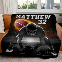 Football lineman throw blanket view 6 highlighting offensive center stance, flaming football, and stadium lights