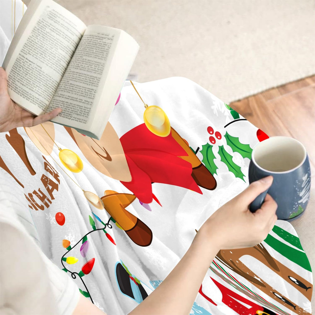 Christmas reindeer buffalo plaid throw blanket displaying cartoon reindeer and holiday bulb string garland