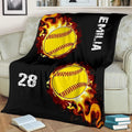 Fiery softball bedroom decor showcasing vivid yellow softballs enveloped in blazing orange flames against black.
