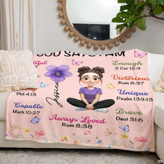 Faith affirmation blanket draped across modern living room armchair