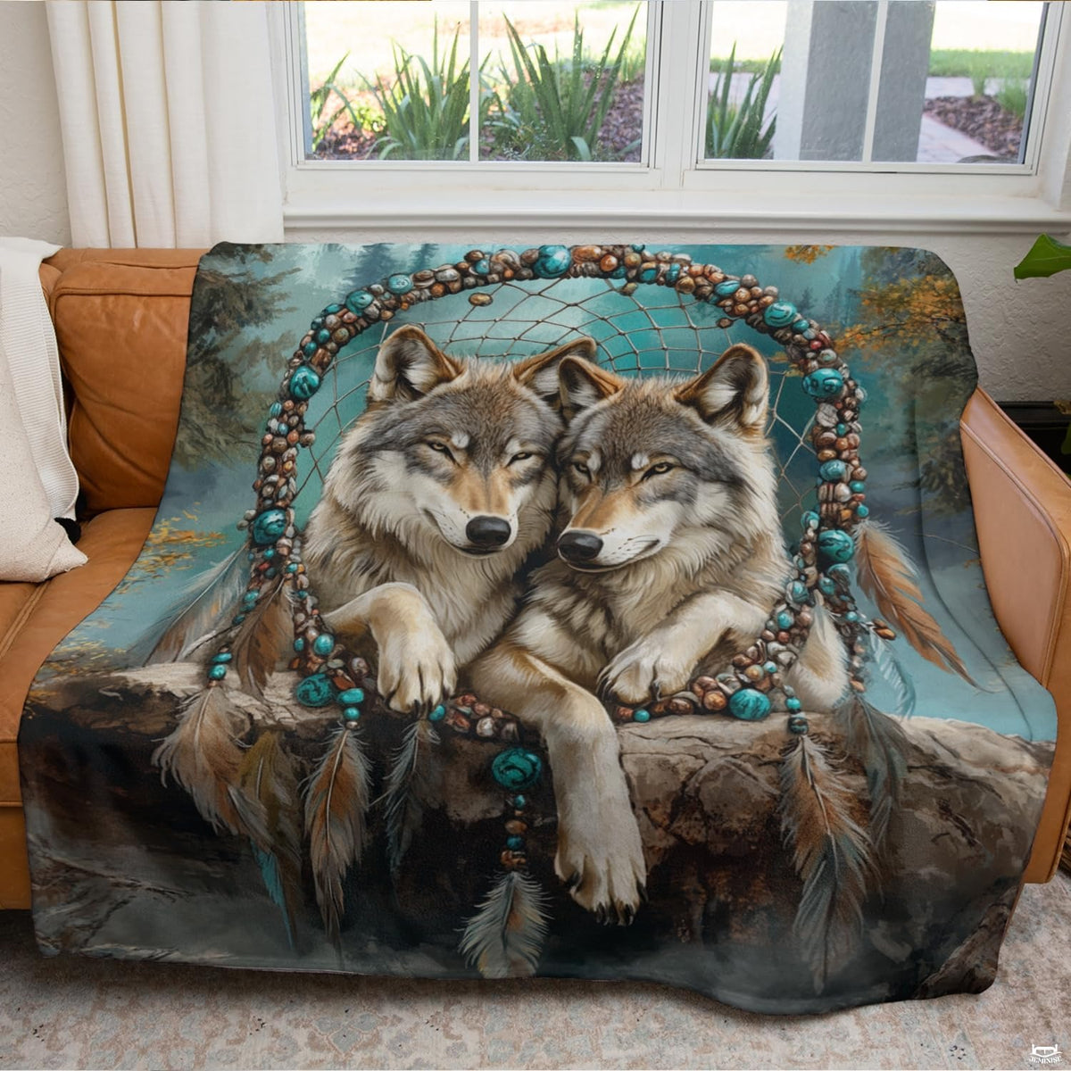 Living room display showing two wolves framed in a turquoise beaded dreamcatcher hoop.