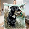 Black lab duck hunting bedding display featuring wetland retriever artwork and flying mallard drake on lake waters.