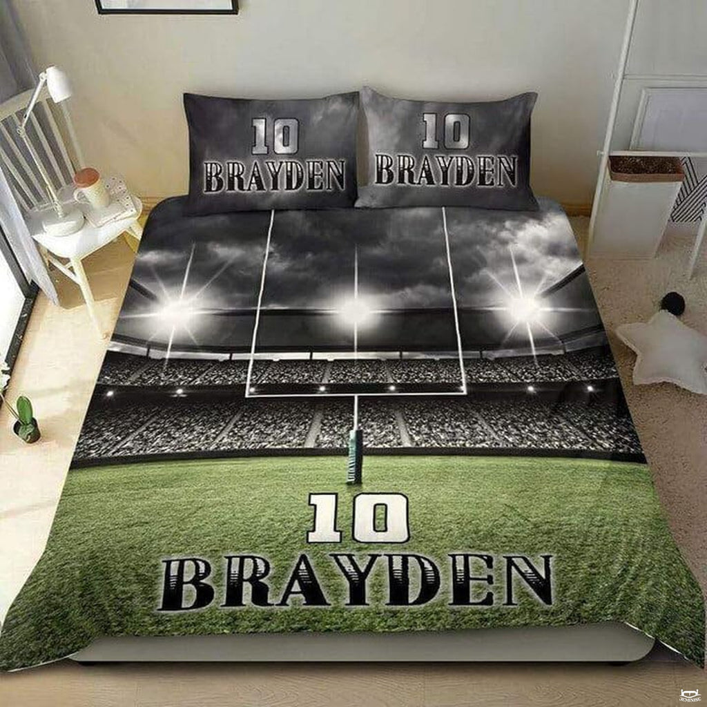 Championship gold football sports bedding featuring textured football graphic and yard lines on a bed