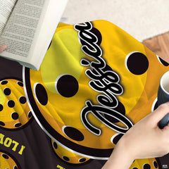 Yellow perforated pickleball pattern with central badge, view 8.