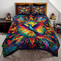 Blue hummingbird with magenta orange wings over a geometric circular burst