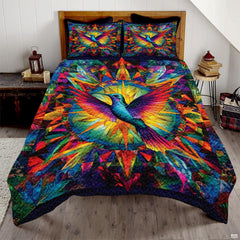 Blue hummingbird with magenta orange wings over a geometric circular burst