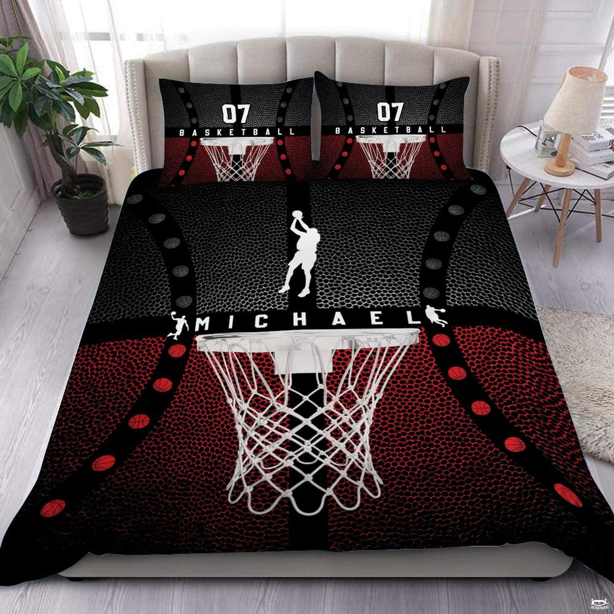 Red and black basketball sports bedding featuring hanging net and jump shooter silhouette on a modern bed