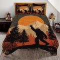 Golden amber Bigfoot Sasquatch woodland bedding set displayed on a bed in a rustic timber bedroom