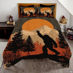 Golden amber Bigfoot Sasquatch woodland bedding set displayed on a bed in a rustic timber bedroom