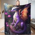 Fantasy digital illustration of purple dragon with amber wings on mossy rock with pink flowers, view 1.