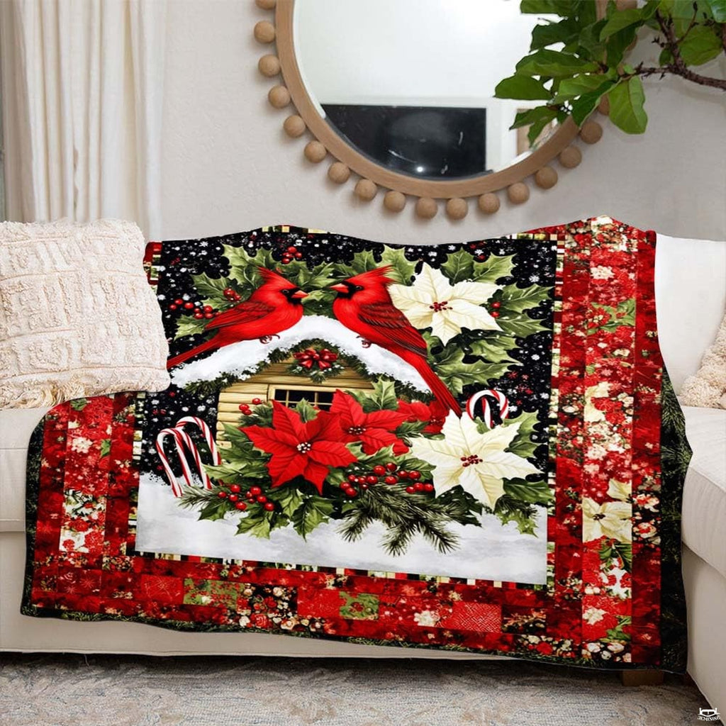 Rustic lodge inspired bedding motif showing scarlet birds in a starry winter scene.