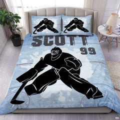 Steel blue ice hockey goalie sports bedding set featuring imposing goalkeeper graphics and scattering ice shards
