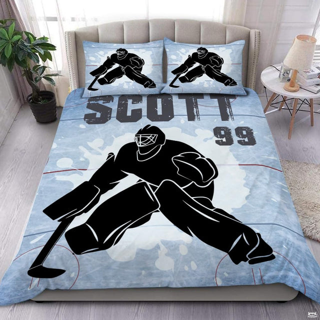 Steel blue ice hockey goalie sports bedding set featuring imposing goalkeeper graphics and scattering ice shards