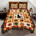 Autumn black cat bedding featuring central feline silhouette surrounded by pumpkin and maple leaf patchwork blocks
