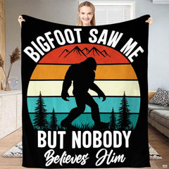 Retro sunset Bigfoot mountain throw blanket featuring Sasquatch silhouette on colorful striped mountain sunset
