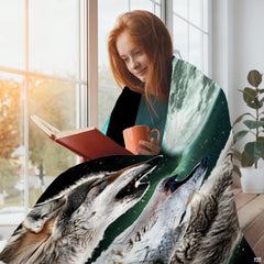 Animal bed covers showing close-up artwork of howling wolves under radiant moonlit night skies.