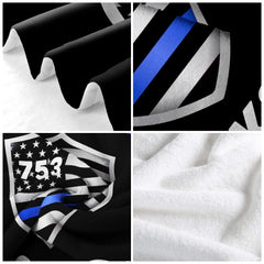 Thin Blue Line shield blanket draped over domestic armchair