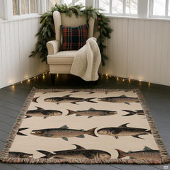 Lodge style bedroom featuring trout print bedspread decor with antique scientific fish illustrations.