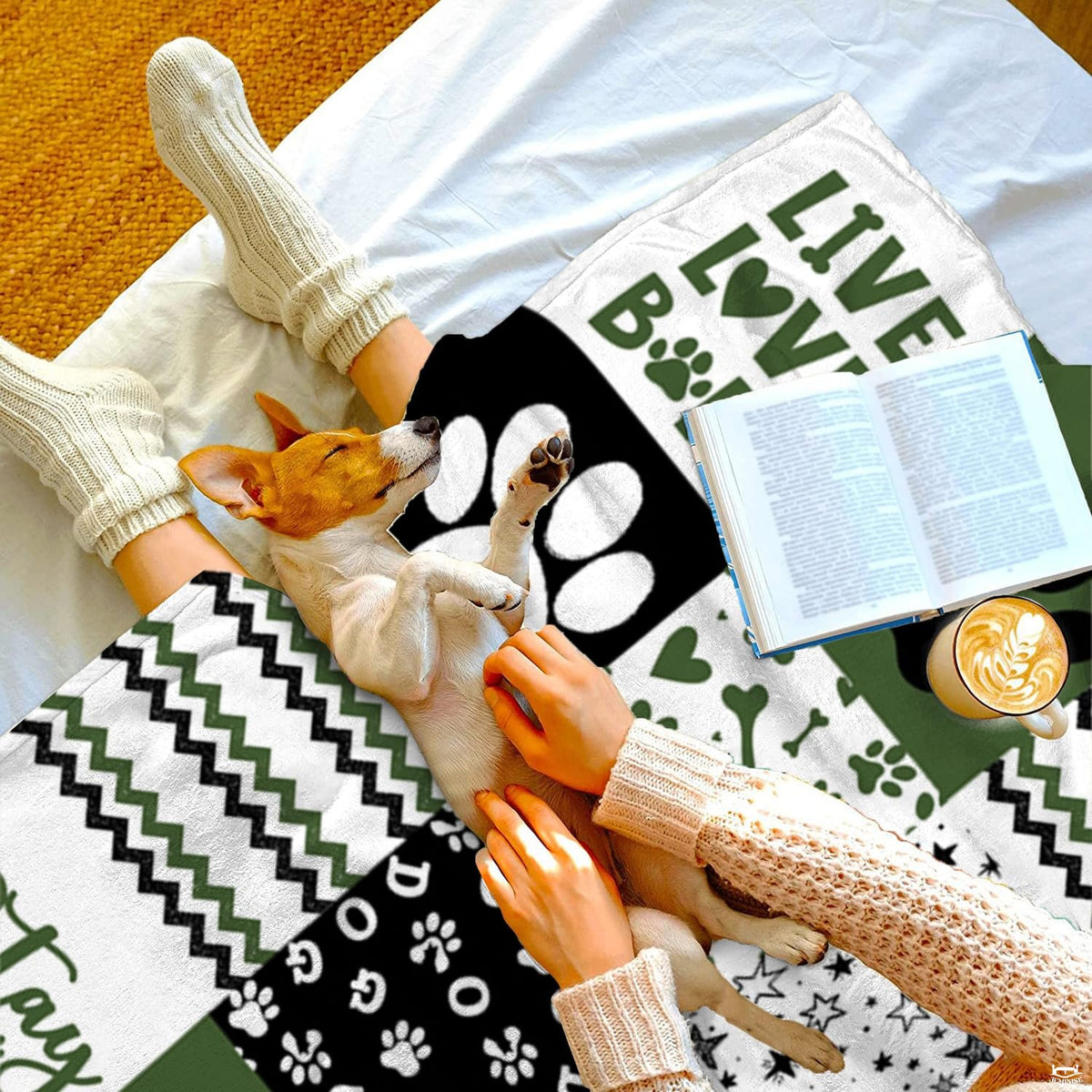 Artistic dog paw bedding pattern featuring alternating black, white, and olive green decorative square blocks.