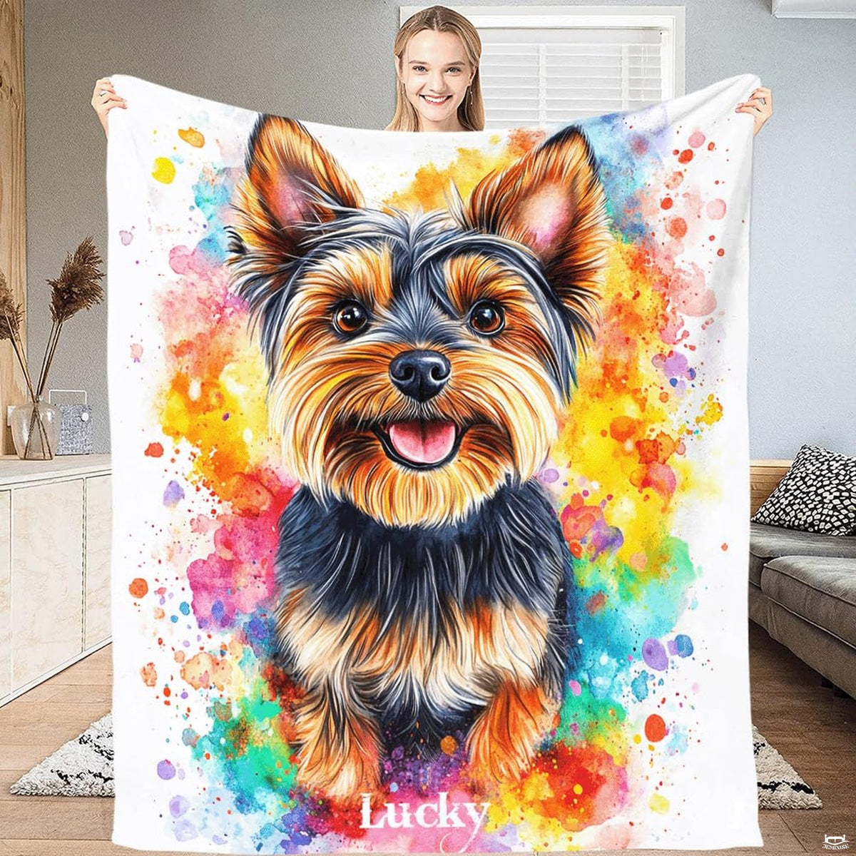 Close-up of artistic Yorkshire Terrier face with warm brown eyes on white background bedding.