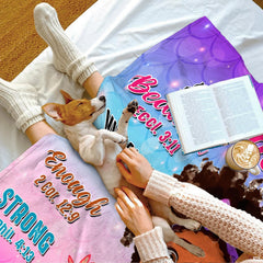 Folded cartoon girl blanket showing vibrant pink and purple tones.