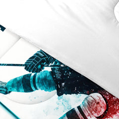 Folded presentation of ice hockey bedding displaying sharp graphic clarity in ocean teal and coral tones