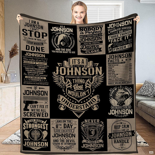 Multi-panel graphic bedding set featuring vintage typography emblems and heraldic crests in charcoal and cream.