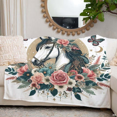 Close-up of celestial floral horse bedding graphic highlighting crescent moons, butterflies, and beaded motifs.